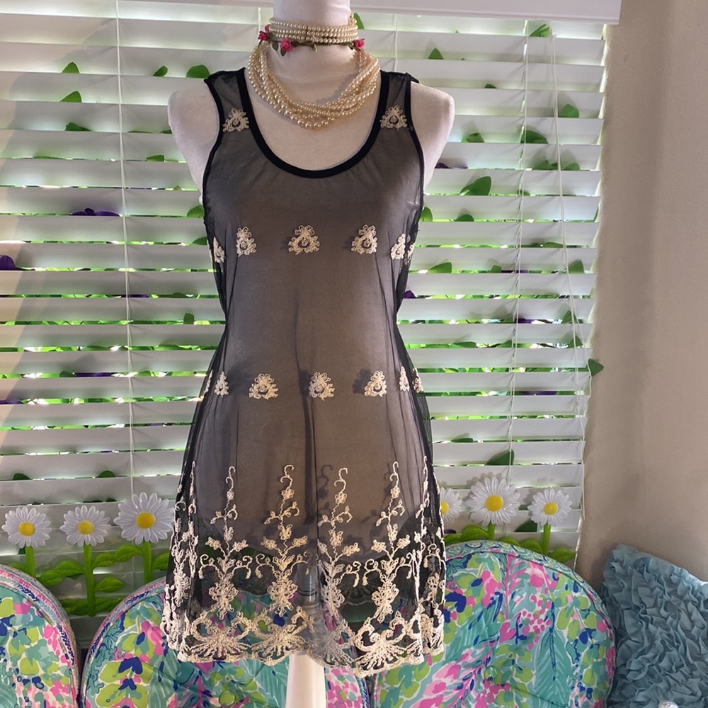 Sheer black dress with cream embroidery